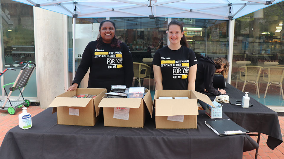 VU Vollies at a stall on Footscray Park