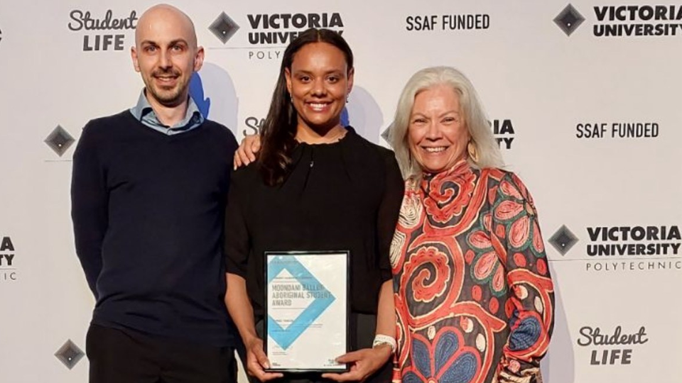 L-R: Marcus Brooke, Tahnee Towers and Karen Jackson. Marcus, Tahnee and Karen are standing together and smiling, Tahnee is holding an awards certificate.