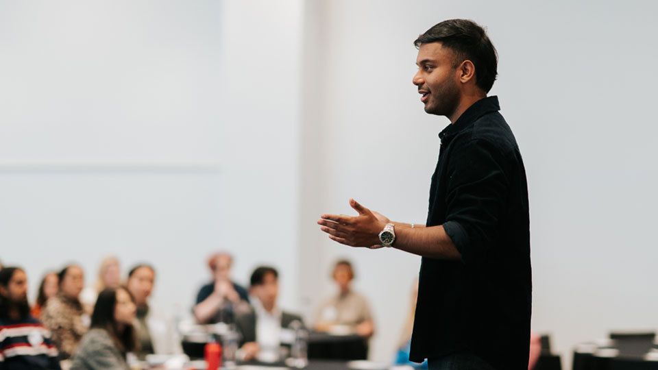 Jahin Tanvir speaking to the audience at the Student Leadership Conference
