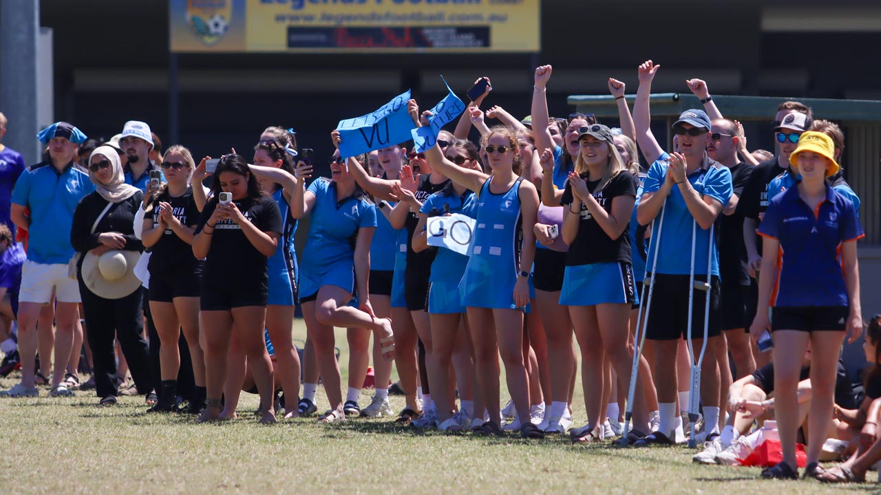 VU Vultures cheering on their team from the sidelines