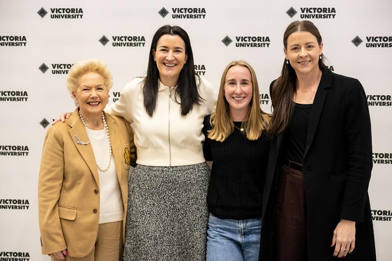 Women standing together at event