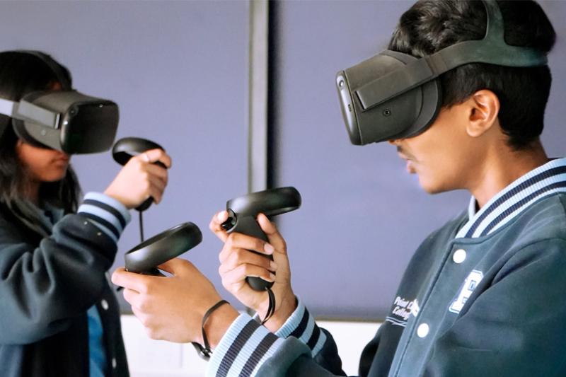 Two secondary school students using virtual reality headsets at Wyndham Tech School