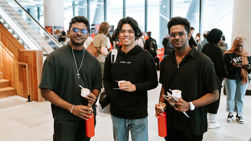 Three male students in the foyer at O-Fest City Campus