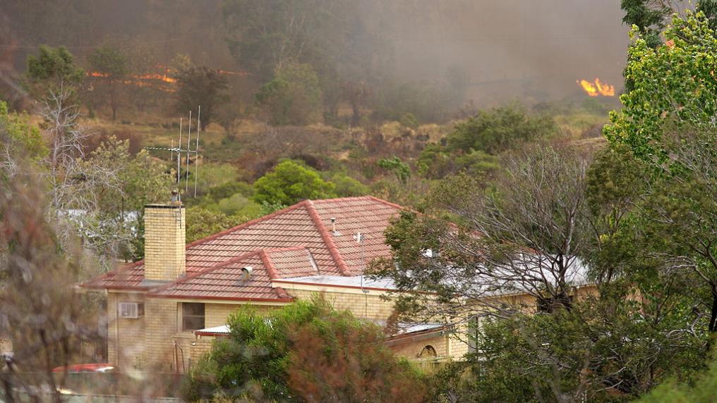 House threatened by fire